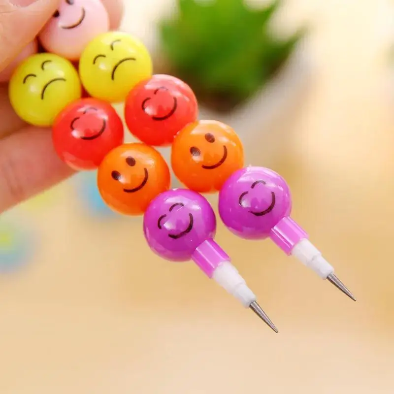 14 bunte Buntstifte mit fröhlichen Cartoon-Gesichtern, ideal für Kinder und Schüler zum Malen. Perfekt für Schulbedarf