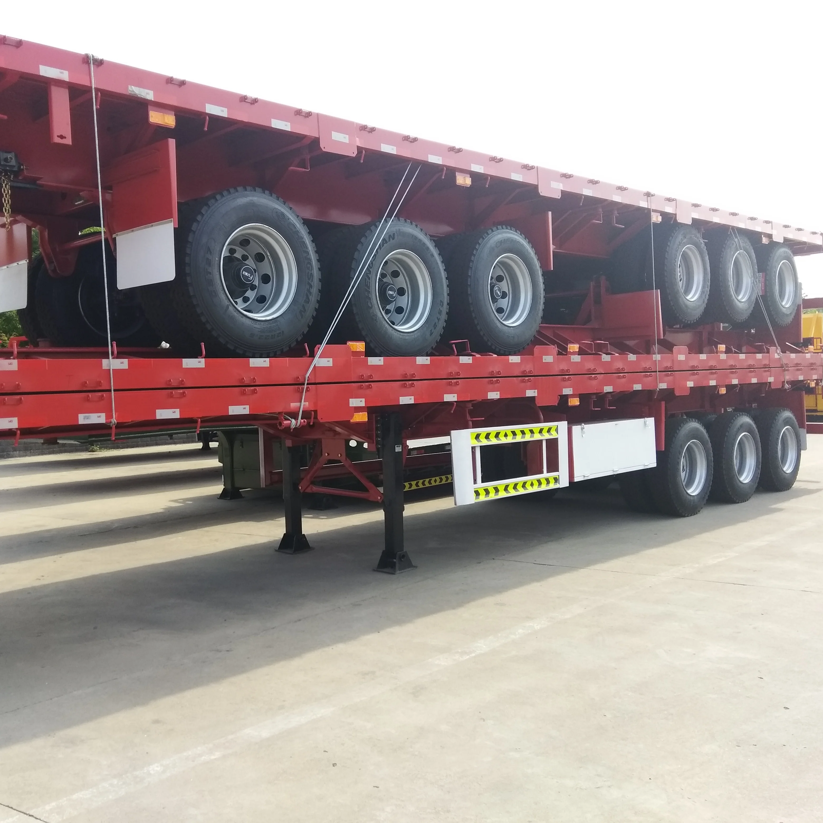 High Quality 2 3 4 Axles 30-100 Tons  Flatbed Semi Trailer for Transport Bulk Cargo