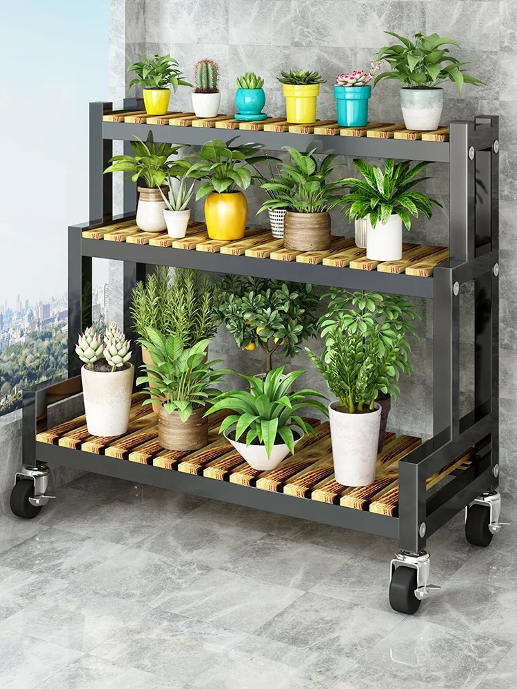 Solid wood flower rack, floor standing, multi-layer iron balcony storage rack, simple modern succulent flower pot rack in the li