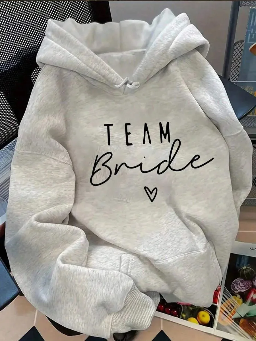 

Wedding - inspired Pure Cotton Hoodie Showcasing Bridal Squad Design - A Stylish Pick for Wedding Enthusiasts