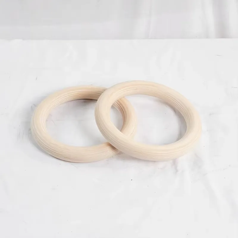 Adjustable wooden gymnastics ring with anti-skid cam buckle suspension trainer for home gym workouts