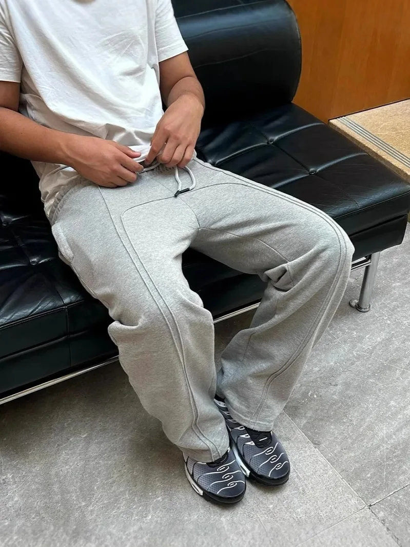 

2025 Spring Fall Mens Casual Pants Streetwear Hip Hop Style Loose Solid Color Draped Pants Men Clothing Trendy Drawstring Pants