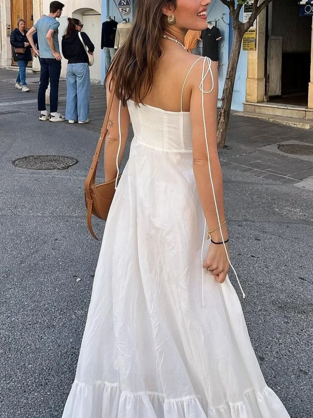 Vestido Retro de viajero para mujer, novedad de verano, tirantes negros, costura multicapa, vestido para vacaciones en la playa, moda informal Sexy con cuello en V