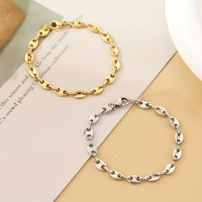 

Fashionable and minimalist stainless steel coffee bean shaped elegant oval hollow chain women's accessory, simple and elegant, suitable for daily wear or parties as a fashionable women's bracelet and jewelry accessory, is an exquisite gift for women.