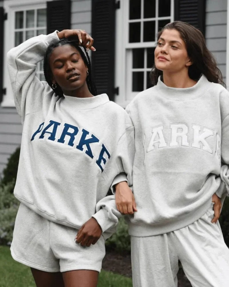 Sudadera de cuello redondo estampada a la moda para mujer con corte holgado informal de terciopelo para otoño e invierno