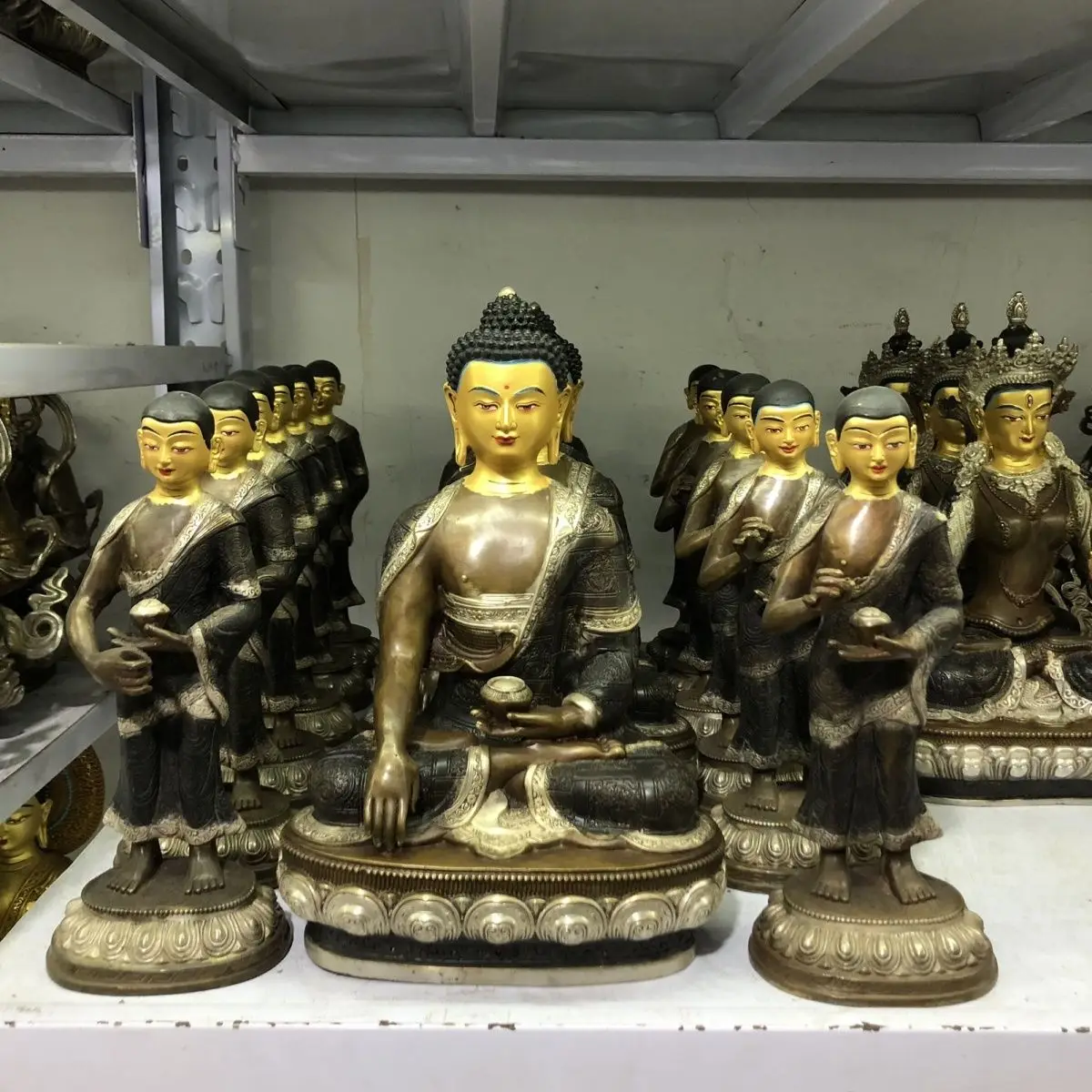 A set of three Sakyamuni Buddha masters and apprentices, a set of pure copper Buddha statue ornaments, the master is one foot hi