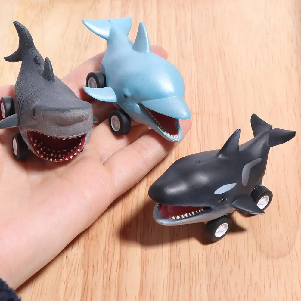 Grote witte haai Druk op en ga auto Walvishaai Leuke dolfijn traagheid auto Montessori Mini Killer Whale Pull Back Car Girls