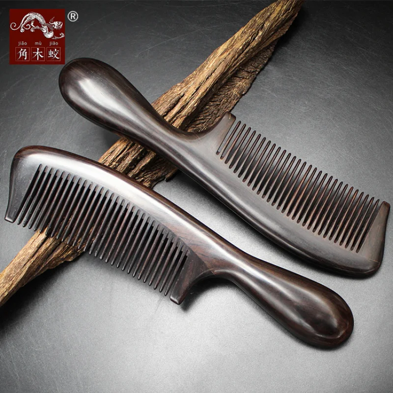 

Ebony black sandalwood comb with fine teeth and round handle