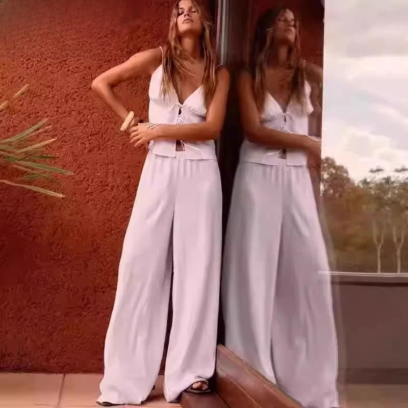 طقم نسائي صيفي من الساتان الحريري بتصميم عقدة الفراشة وبنطلون واسع الساق، أسلوب متعدد الاستخدامات بطول عادي ولون موحد