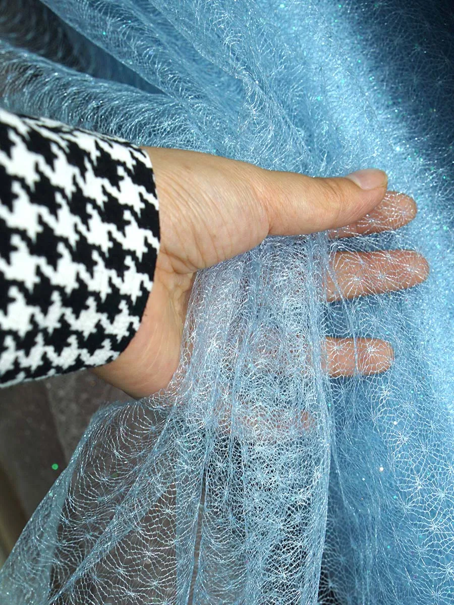 

Translucent And Shimmering Tulle Fabrics In Multiple Colors With Glittering Sequins For Wedding Gowns And Evening Dresses