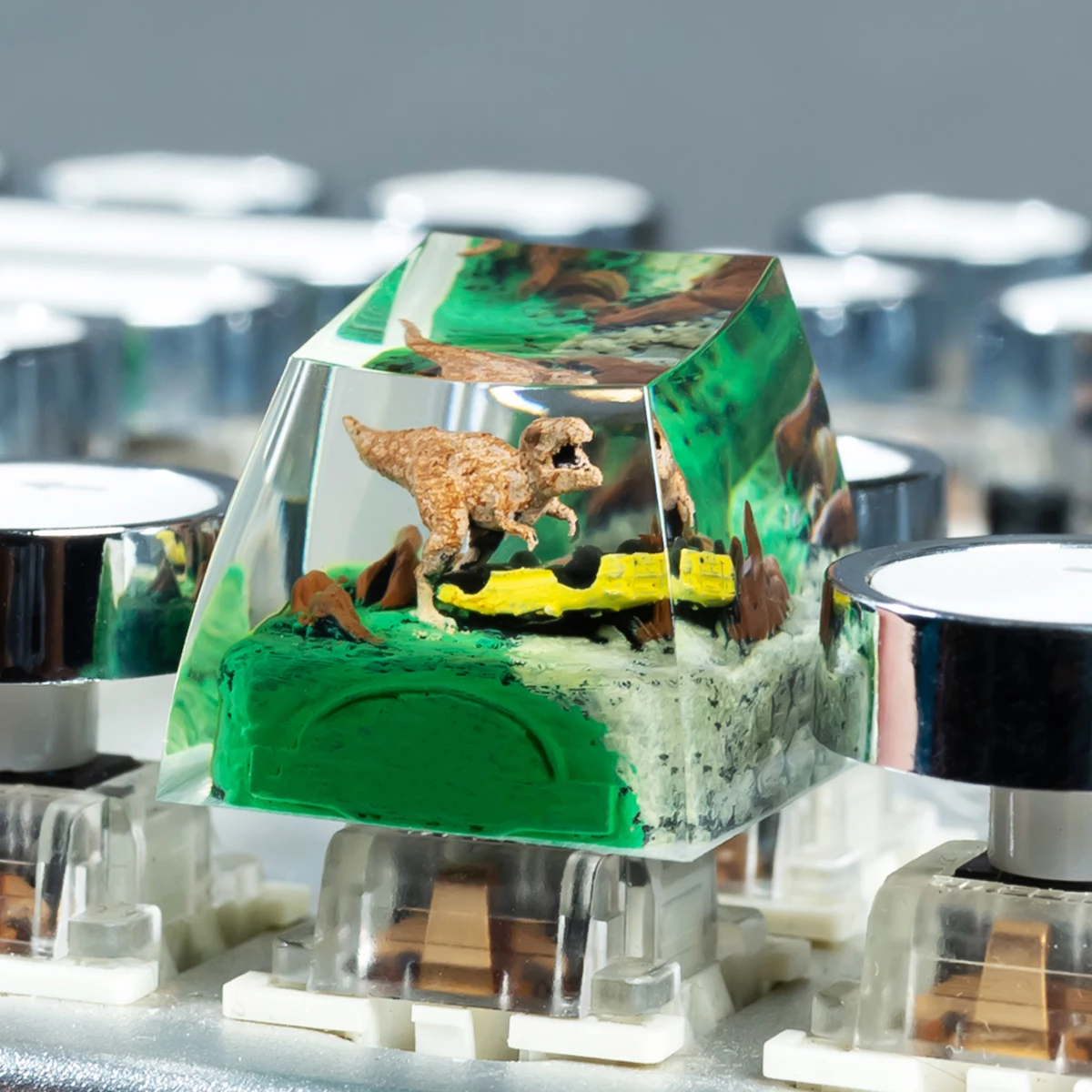 

Handmade T-Rex Resin Keycap – Streamlined contour & backlit design for Cherry MX keyboards, an excellent gifting choice.