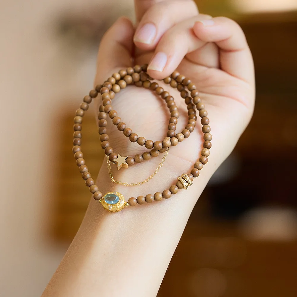 

Новый китайский стиль экзотическая принцесса натуральный 4 мм индийский старый сандал для женщин с аквамариновой звездой и луной многослойный браслет