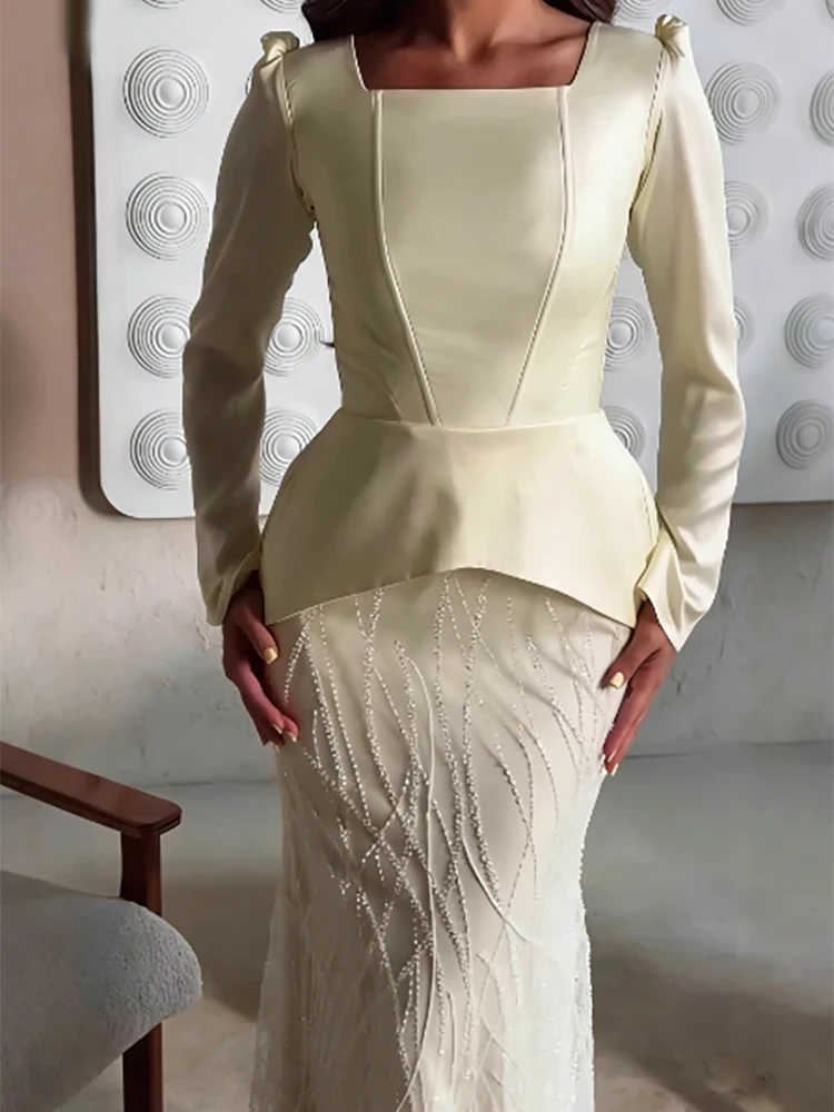 

Elegant women's skirt set with a casual square neckline long sleeves waist cinched spring and autumn new long skirt set