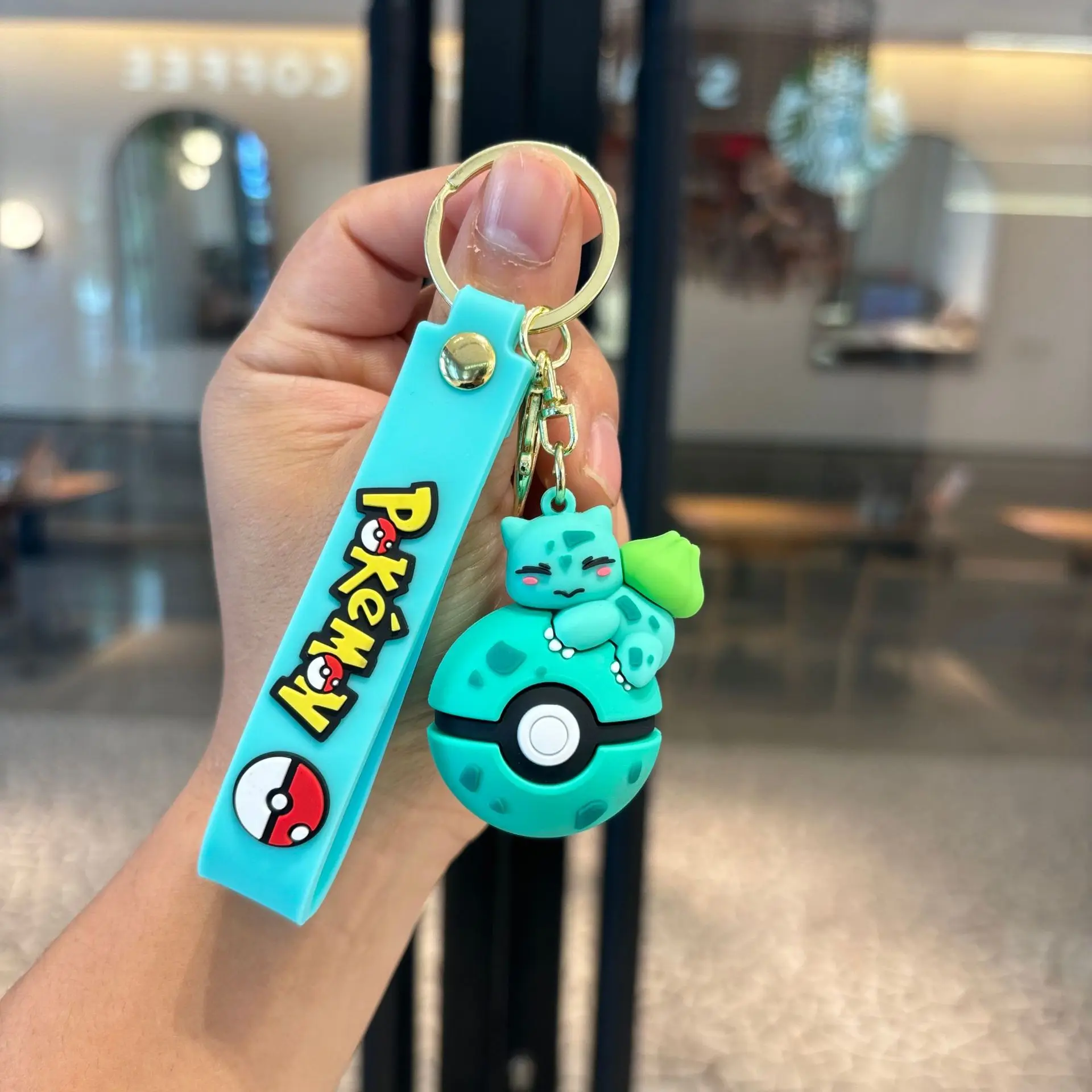 مجموعة سلسلة مفاتيح على شكل كرة بوكيمون بوكي، سلسلة مفاتيح على شكل شخصية بيكاتشو إيفي تشارماندر، حلقة مفاتيح قابلة للجمع من الرسوم المتحركة كهدية لحقيبة الظهر