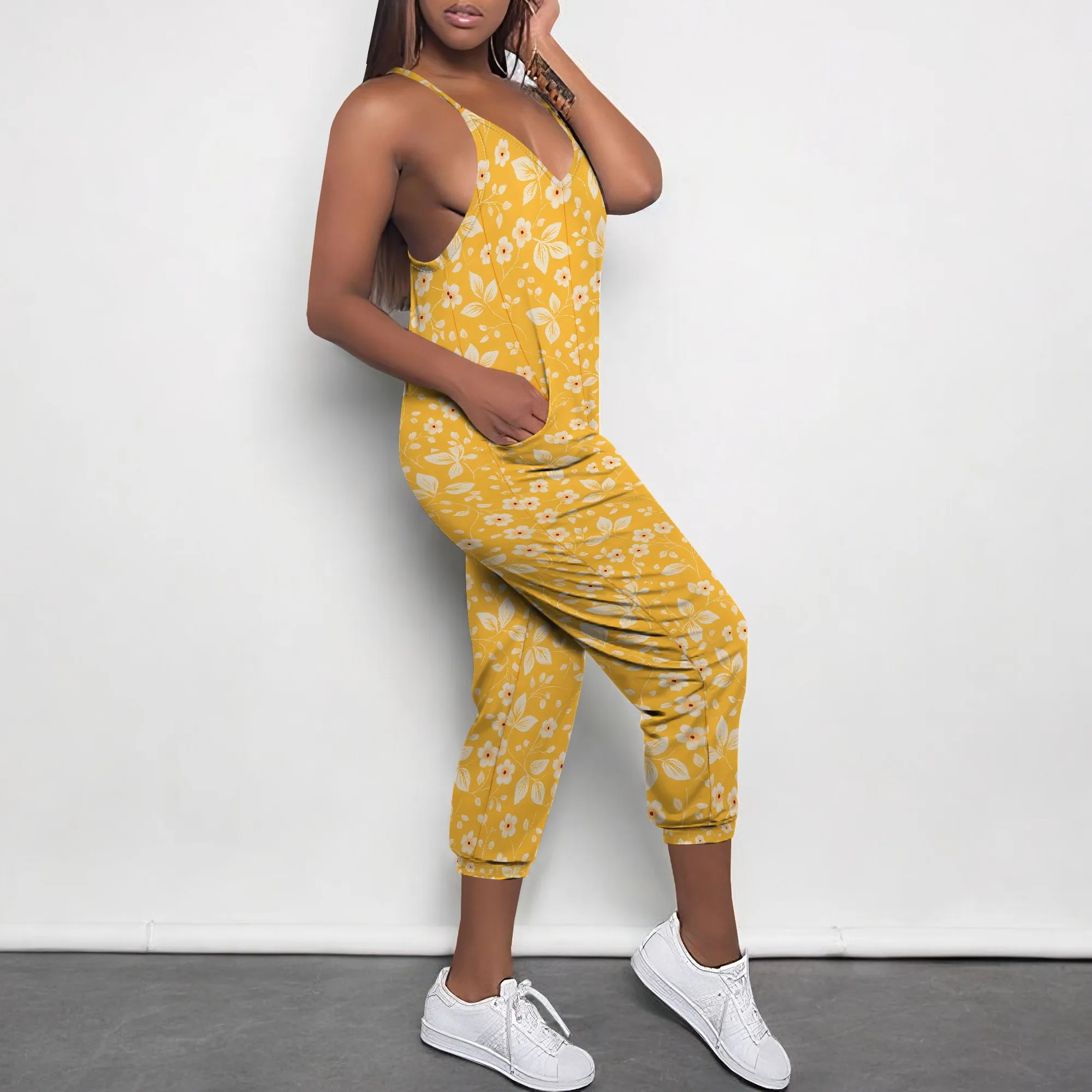 Estate nuova tuta da donna elastica allentata stampata multicolore con scollo a V profondo senza maniche tracolla sottile con tracolla e tasca