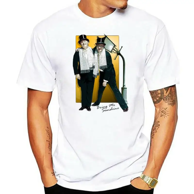 

Title: T-SHIRT Morecambe and Wise - Bring Me SunshineMen's & Women's Tees in (LazyCarrot) classic comedy singing in the rain