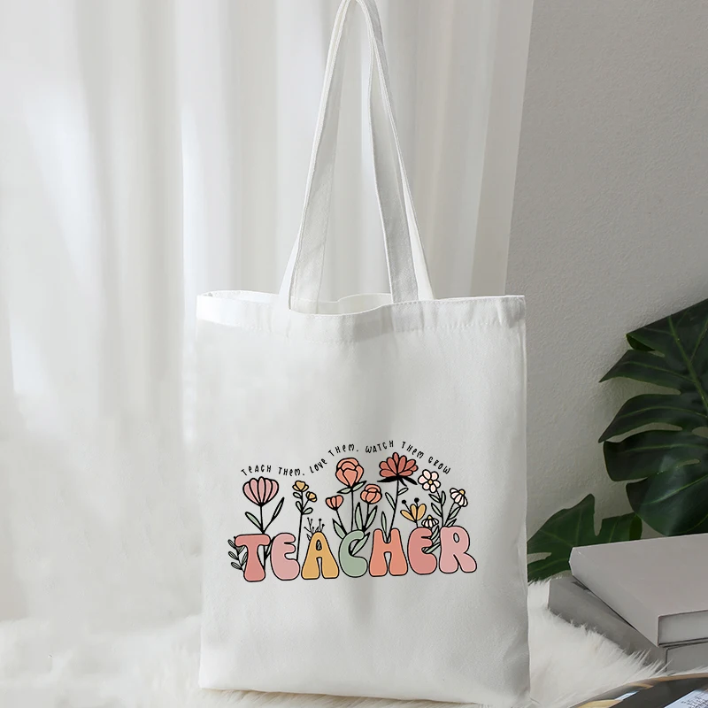 Teach Them Love Them Watch Them Grow Flower Pattern Tote Bag for Women Canvas Shopping Bags Back to School Foldable Handbag