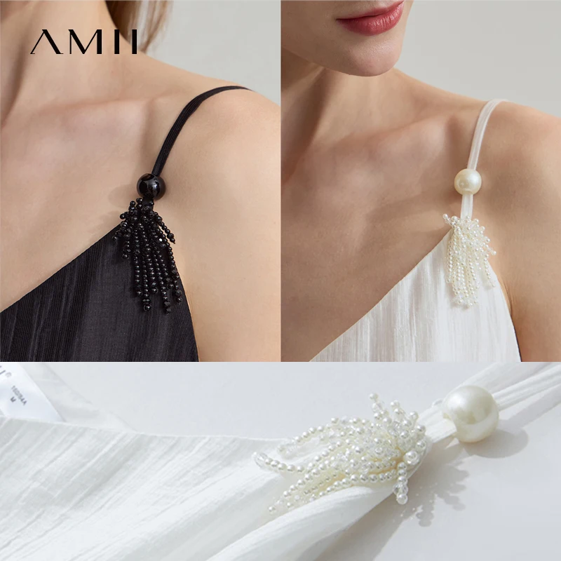 Amiiชุดผู้หญิงMinimalist 2025 ฤดูร้อนสไตล์ใหม่พื้นผิวรู้สึกLyocellลูกปัดดอกไม้VคอSuspenderชุดสีดํา 12542047