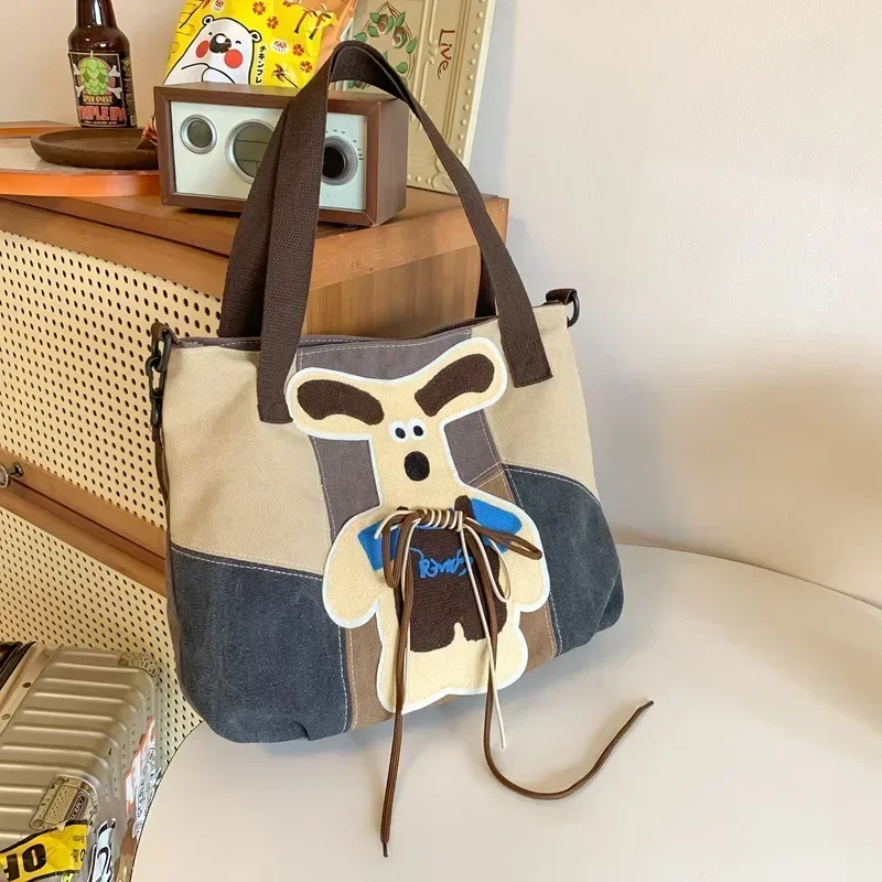 

Snoopy Retro Cute Canvas Shoulder Bag Large Capacity Messenger Bag Y2K Color Contrast Student Tutorial Tote handbag