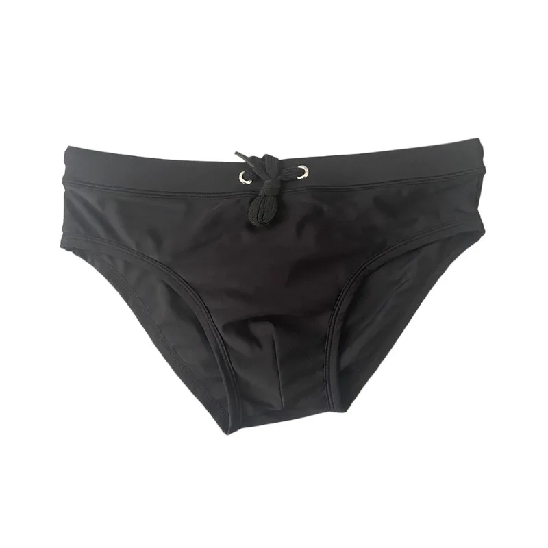 

2025 swimming trunks men's solid color hollowed-out rear mesh briefs cup breathable youth swimming trunks foreign trade 10060zb