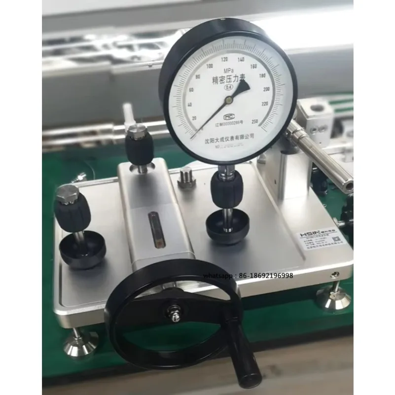 

Pressure comparator, pump calibration table, hydraulic manual pump, pressure gauge, comparator