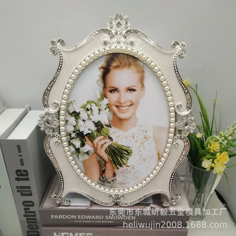 A Silver inlaid pearl diamond oval table with 6 inch 7 inch 10 inch metal photo frame, gift photo frame