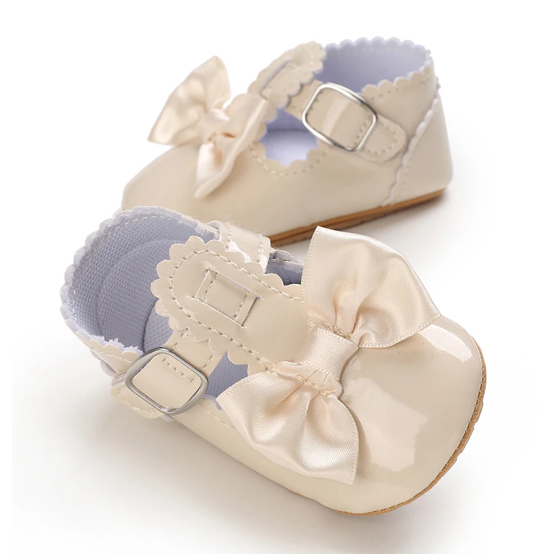 Nuove scarpe bianche Beige scarpe da bambino primaverili scarpe da neonato in pelle PU primi camminatori Princess Bowknot Baby Prewalker