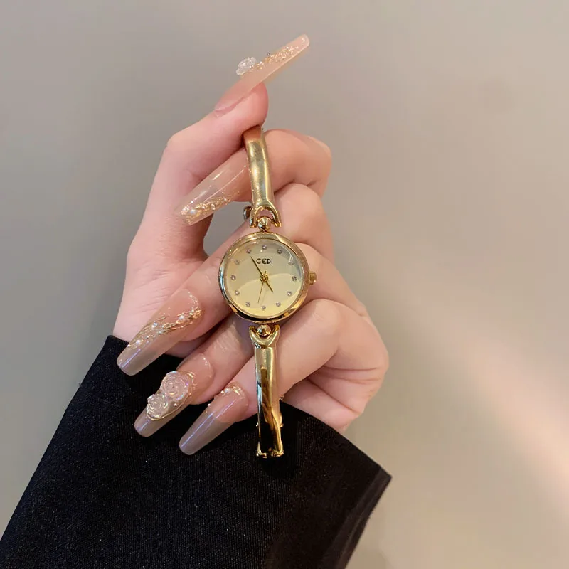 New simple temperament small gold watch fashionable versatile women's hand watch small exquisite water luxury quartz watch gift