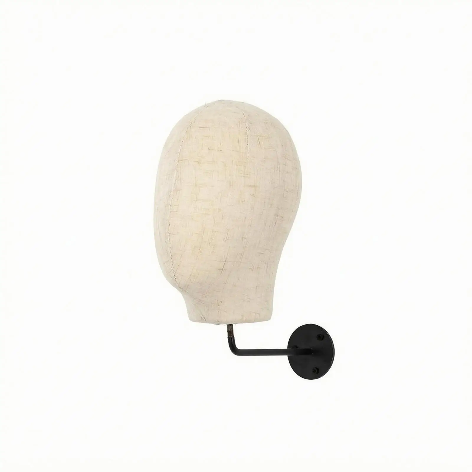 Wall-mounted mannequin head, covered in fabric, with black parts