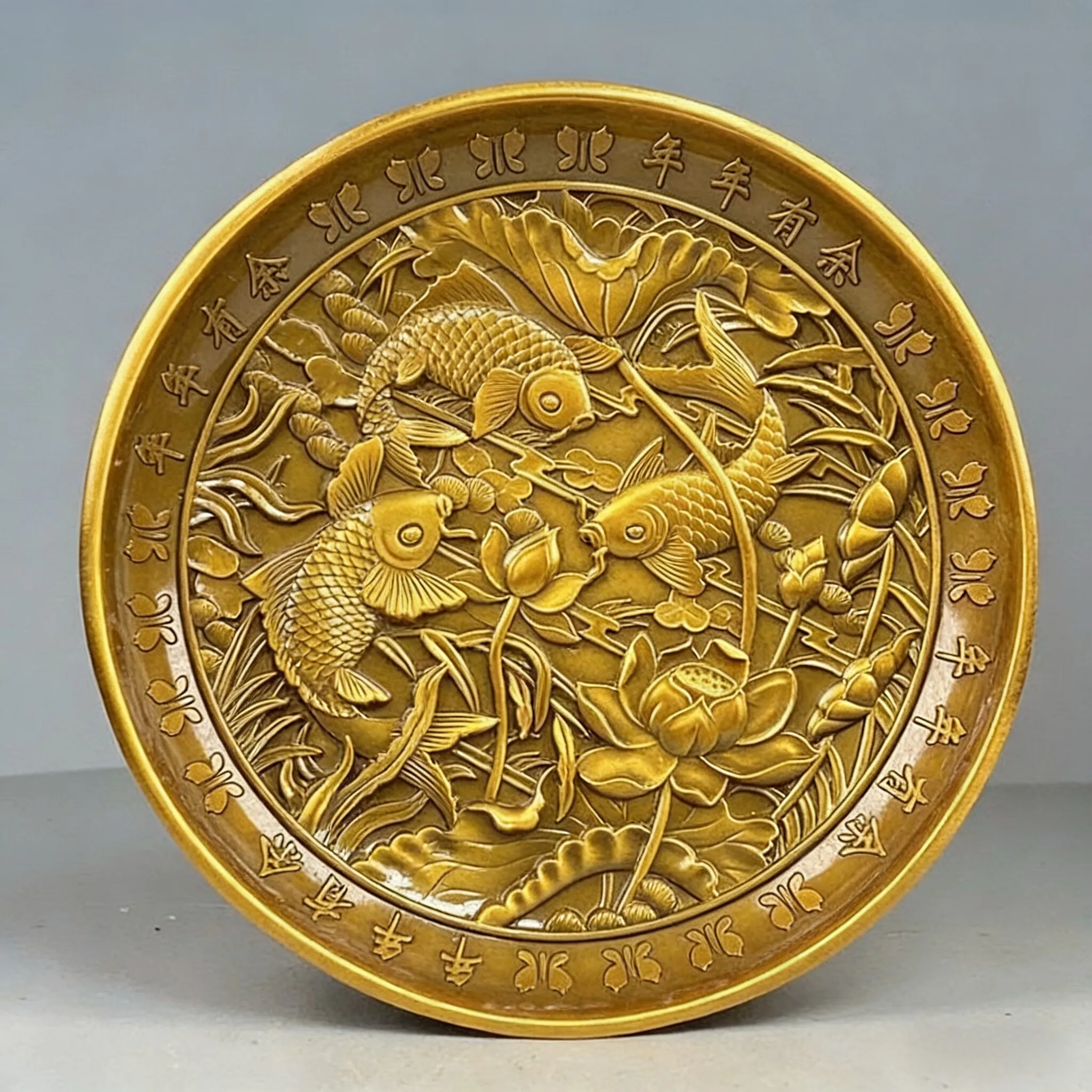 Double-sided three-dimensional relief alloy copper has more than enough lotus plate every year, retro brass Kowloon fish plate o