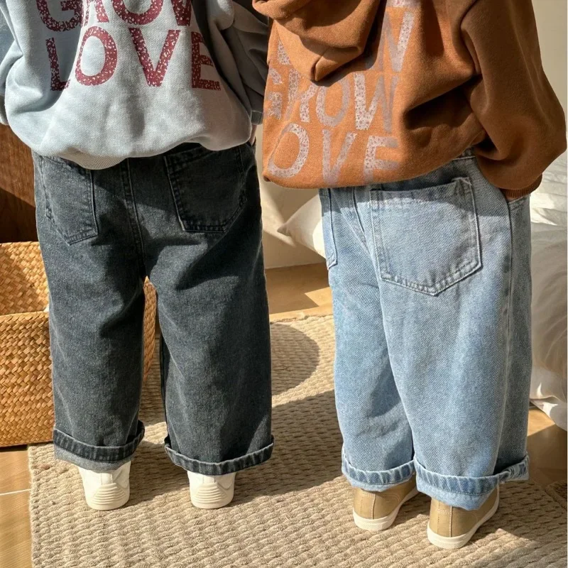 

Unisex children casual all-match jeans 2025 Autumn boys and girls solid color denim wide leg pants