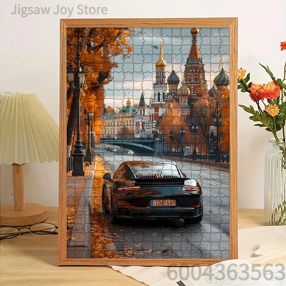 

Paper Jigsaw Puzzle Black Sports Car Rear View on Autumn Street with St. Basil's Cathedral Background Artwork Brain Teaser