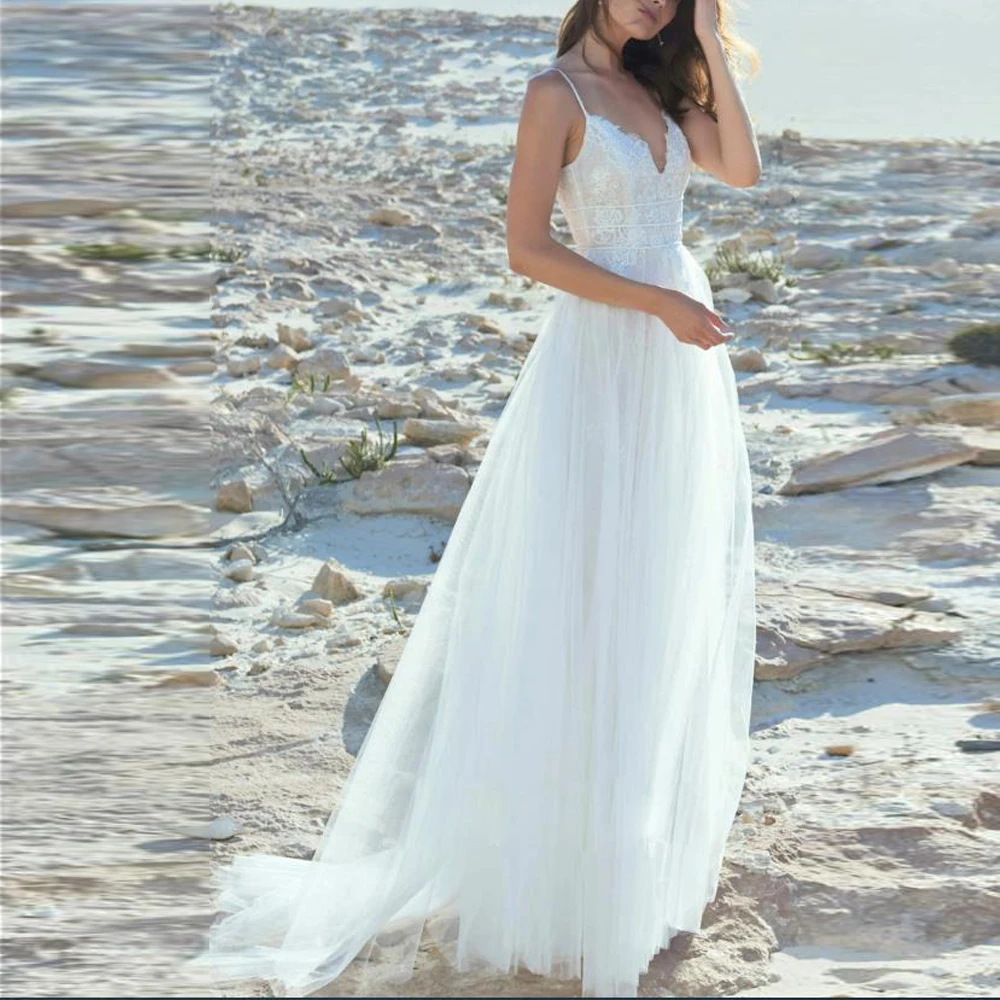 ชุดแต่งงานผ้าทูลล์แบบเปิดหลัง สายเดี่ยวเซ็กซี่  ตกแต่งลูกไม้สไตล์โบฮีเมียน สำหรับเจ้าสาวชายหาด