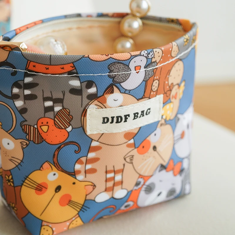 Cosmetic bag small cartoon cat PVC waterproof portable coin purse cosmetics lipstick cushion storage bag commuter clutch makeup