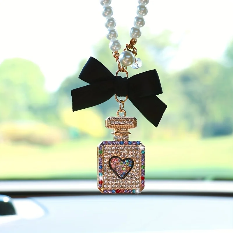 Fashionable bow knot diamond inlaid perfume bottle car interior pendant exquisite with drill car rearview mirror car accessories