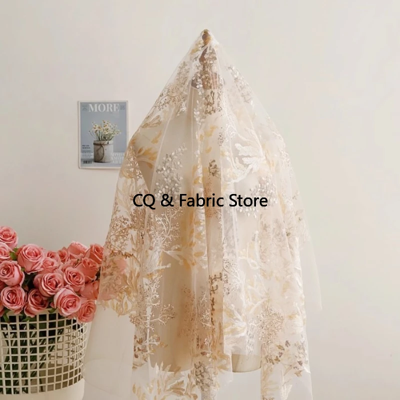 

Абрикосовая вышитая блестками сетчатая ткань для свадебных платьев и вечерних платьев Дизайнерская ткань во дворе