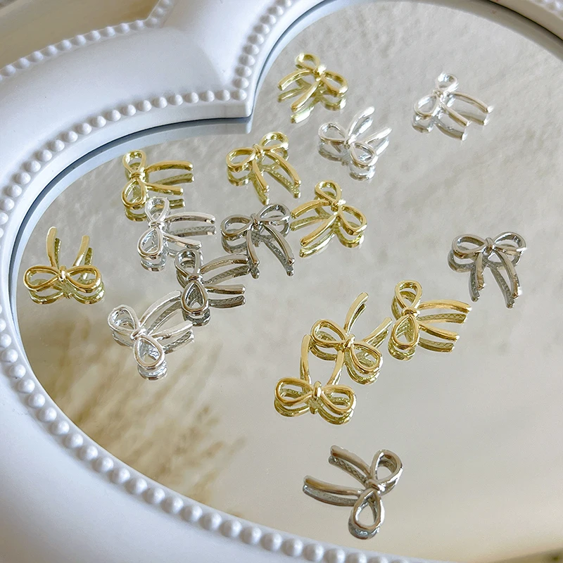 10 sztuk kokarda Deco Nail Art Charm 3D srebrna/złota kokardka wstążka części do dekoracji paznokci DIY luksusowe akcesoria do Manicure