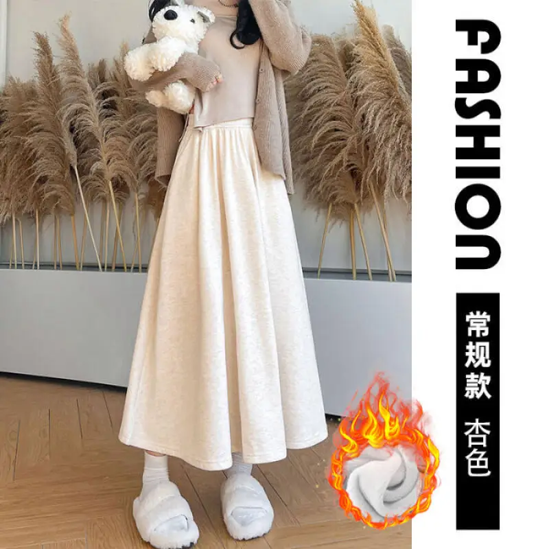 กระโปรงทรงเอไลน์สีข้าวเหนียวสีขาวข้าวโอ๊ต กระโปรงทรงเอไลน์ยาวปานกลางสำหรับผู้หญิง กระโปรงทรงเอไลน์ทรงร่ม สำหรับฤดูใบไม้ร่วงและฤดูหนาว กระโปรงลำลองเอวสูงสำหรับผู้หญิง สไตล์สบายๆ