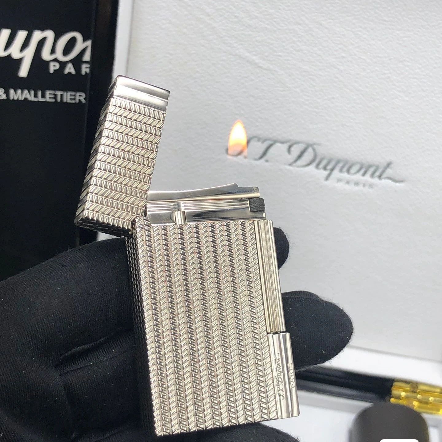 S.T. Dupont Gold and Silver Textured Lighters with Exquisite Craftsmanship, Intricate Detailing Iconic Flame Collection