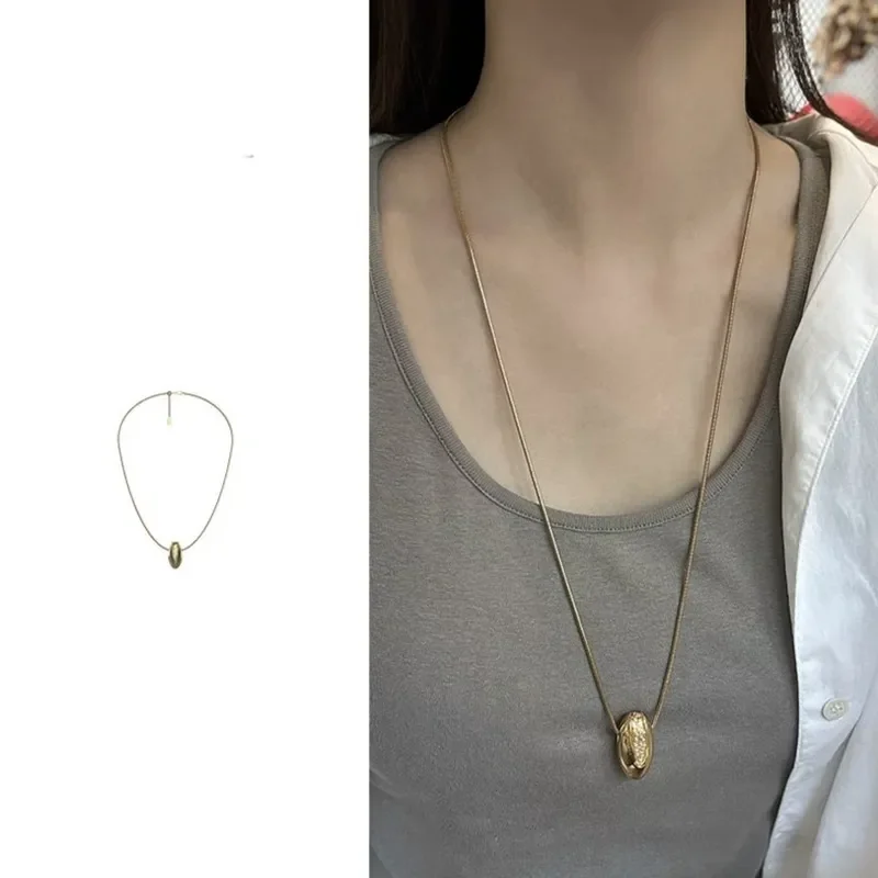 Oval inlaid zirconium long necklace women's niche retro casual versatile pendant cold wind advanced temperament sweater chain