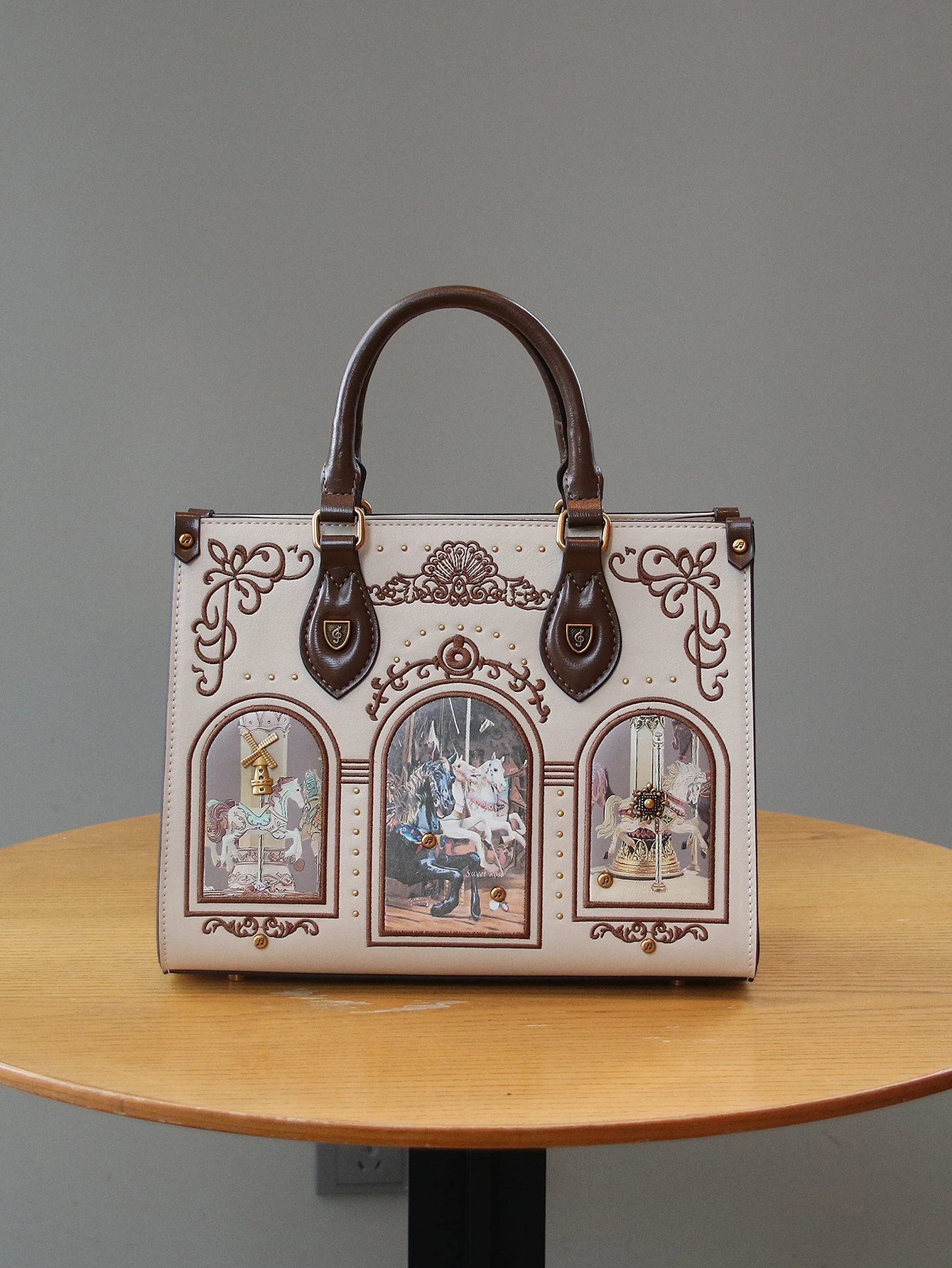 Luxury heavy industry design 2026 retro fashion new ladies' handbags exquisite embroidery thread rivet setting bag window fairy