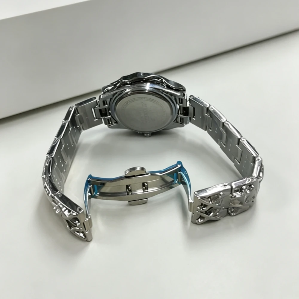 Men's Three-Dimensional Quartz Watch with Punk-Style Butterfly Clasp Strap, Featuring a Calendar and Waterproof Design. a Niche Luxury Fashion Accessory for Trendy Men, Suitable for Streetwear, Hip-Hop, Business, Casual, and Versatile Use. a Creative and Unique Men's Watch. a Popular Quartz Wristwatch