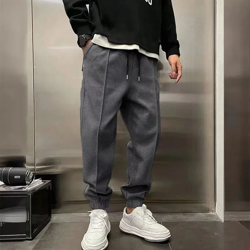 2024 primavera autunno uomo pantaloni Casual tinta unita uomo pantaloni sportivi larghi con coulisse vita elastica palestra allenamento pantaloni da Jogging