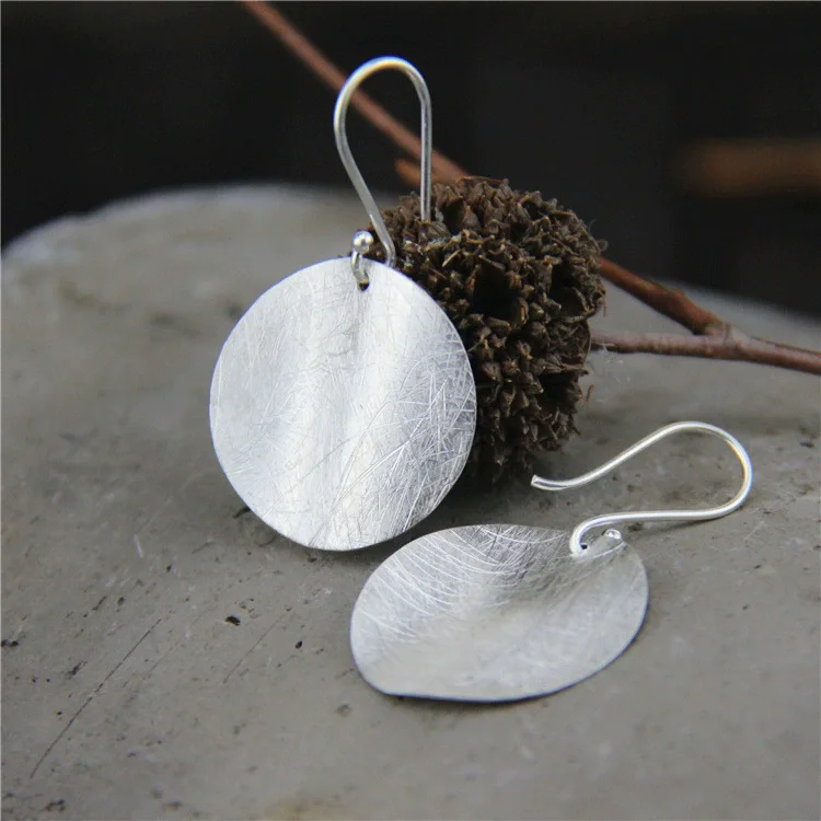 S925 pure silver ear nail female creative twisted wave brushed round card  Fashionable and minimalist  Cold Wind Jewelry