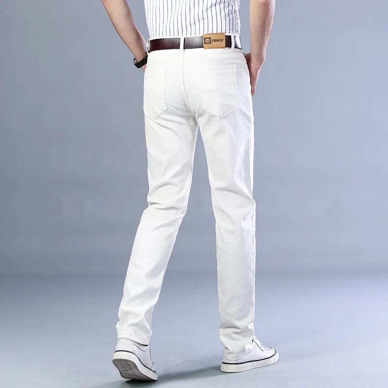 Jeans bianchi puri moda autunno da uomo elastico sottile gioventù che dimagrisce gamba dritta Business Casual pantaloni di fascia alta di mezza età maschile