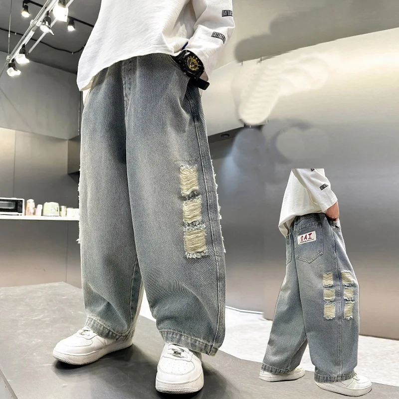 نمط جديد الأطفال فضفاض مستقيم دمرت الجينز للمراهقين الصبي عادية ممزق الدينيم السراويل الكورية الاطفال موضة بنطلون سن 4-14Y