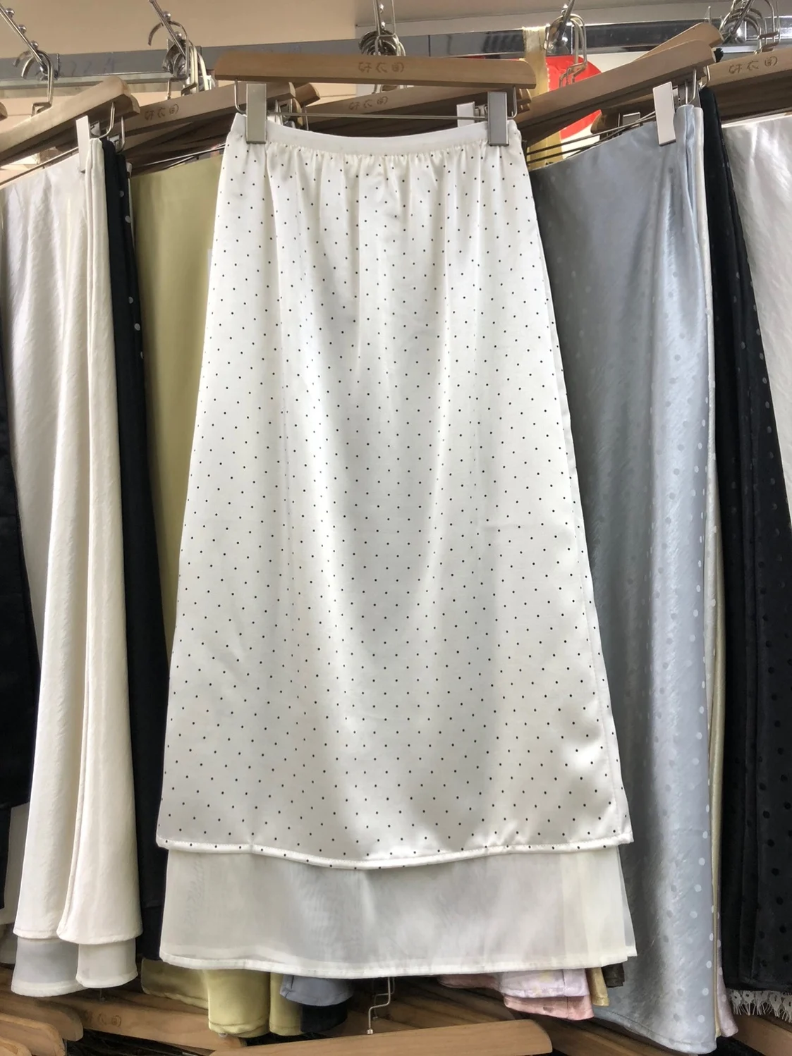

2026 New Design White Polka Dot Asymmetrical Midi Skirt Fashionable Spring Summer Split Half-length Ladies High Waist Skirt
