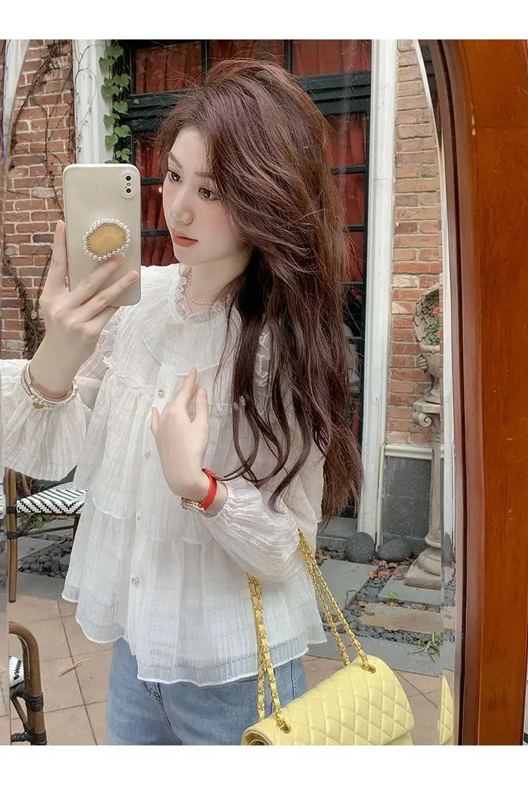 Célébrité française Super fée bulle à manches longues chemise banlieue bouton chemises printemps été feuille de Lotus bord en mousseline de soie Blouse femme