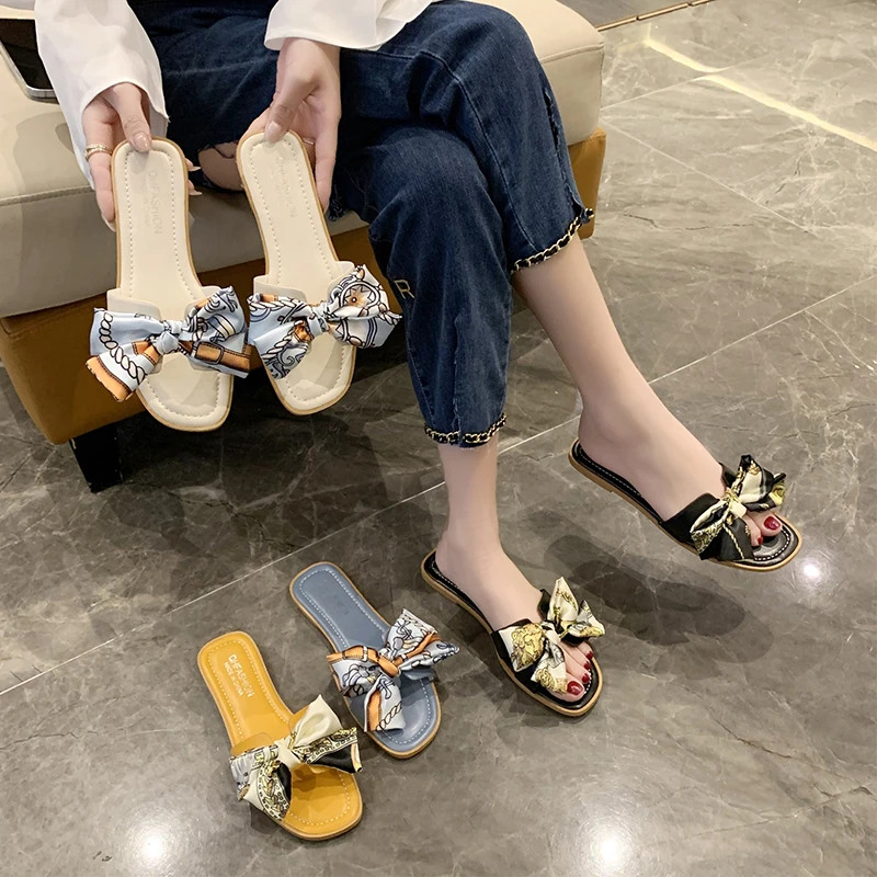 

Women's Summer Fashion Printed Bow Decorated Open Toe Slippers 2026 New Style Luxury Non-slip Comfortable Beach Flip Flops