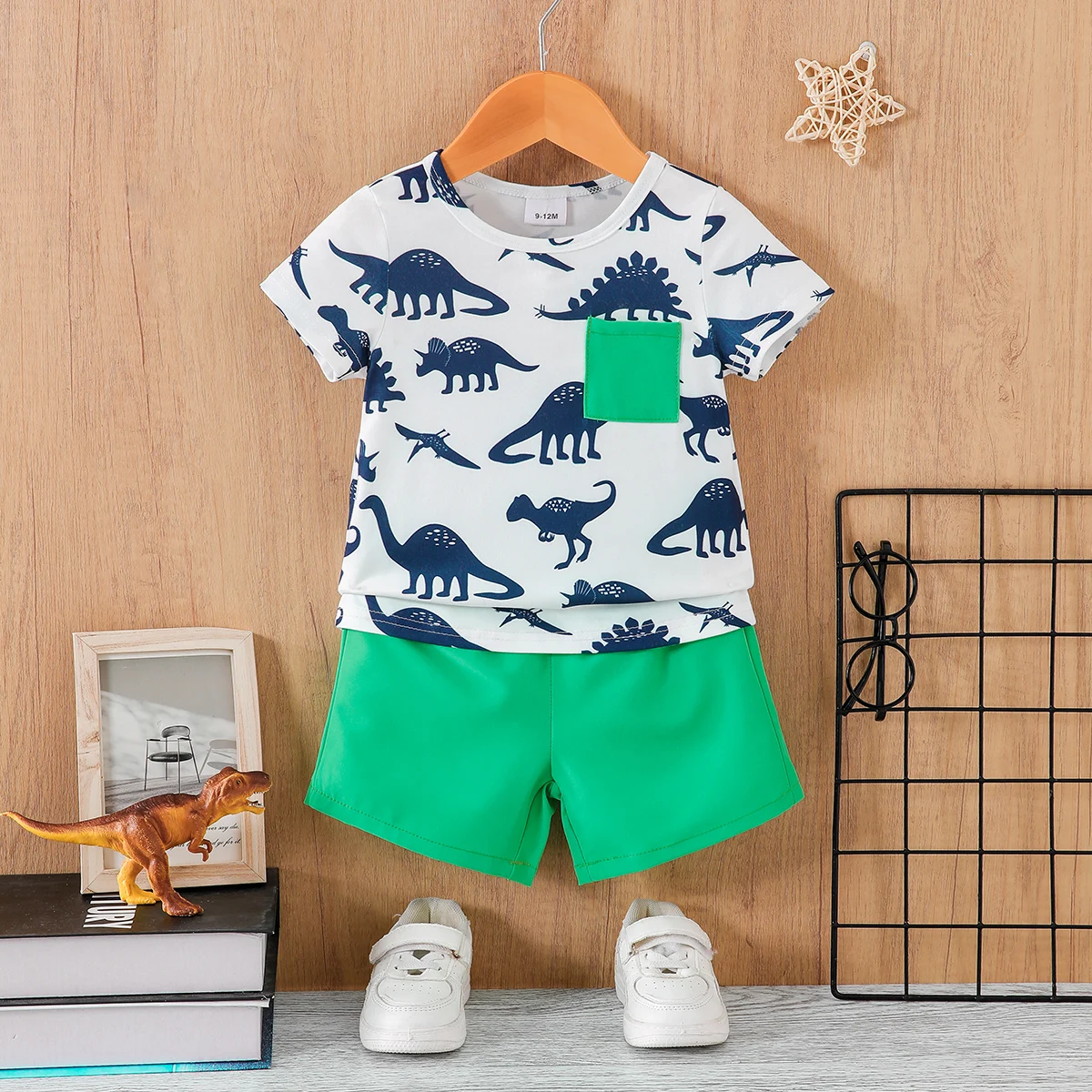 Boys Dinosaur Print Two-Piece Set White T-Shirt with Full Dinosaur Pattern Green Contrast Pocket + Matching Shorts